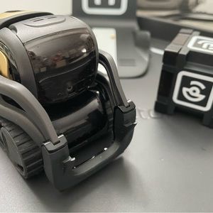 Anki Vector robot and accessories. Robot’s eyes work, but do not light up.